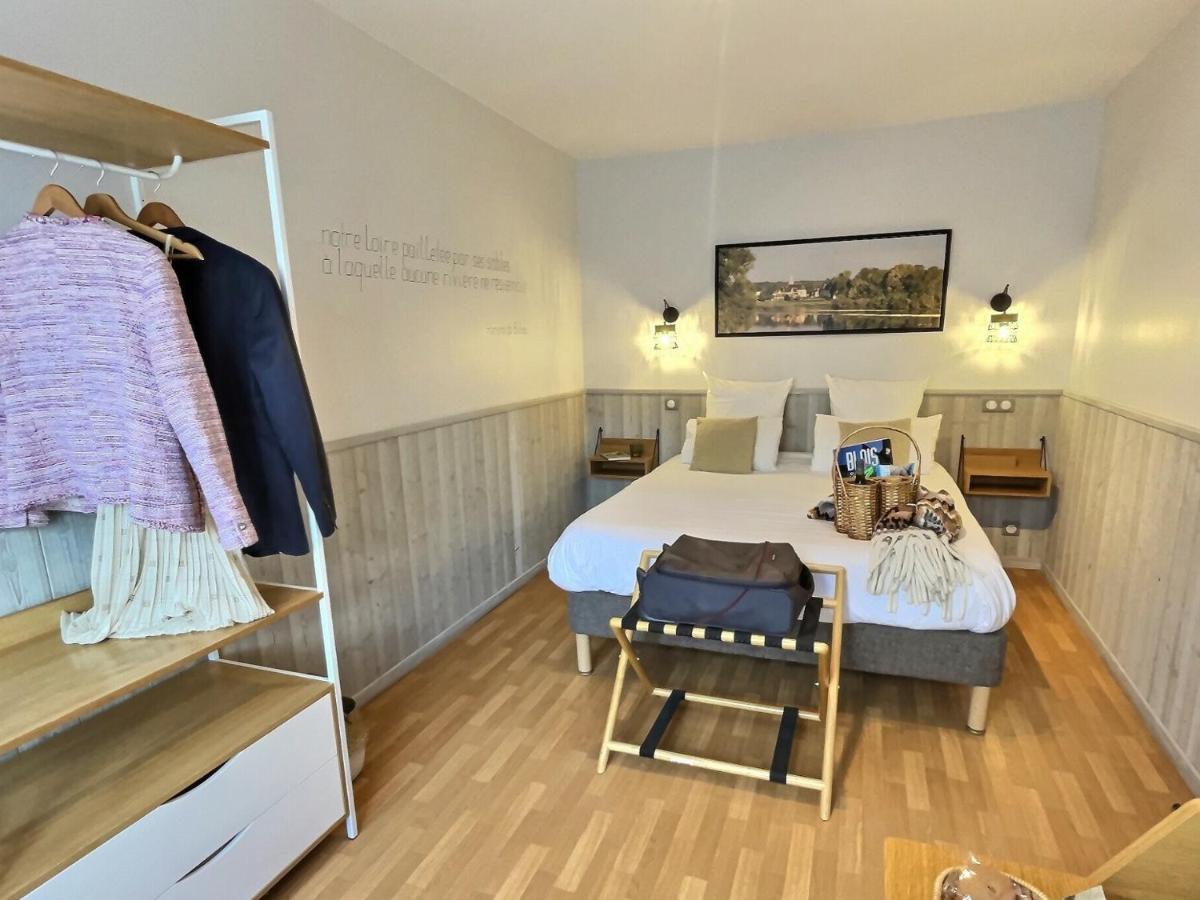 Logis Hotel Du Cygne Брасьє Номер фото